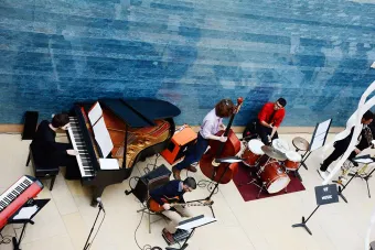 AIME prepares for a concert at the Blanton Museum of Art