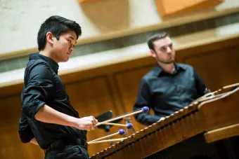 Two Marimba players perform in Bates Recital Hall